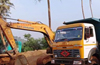 Police raid nets 35 loads of sand